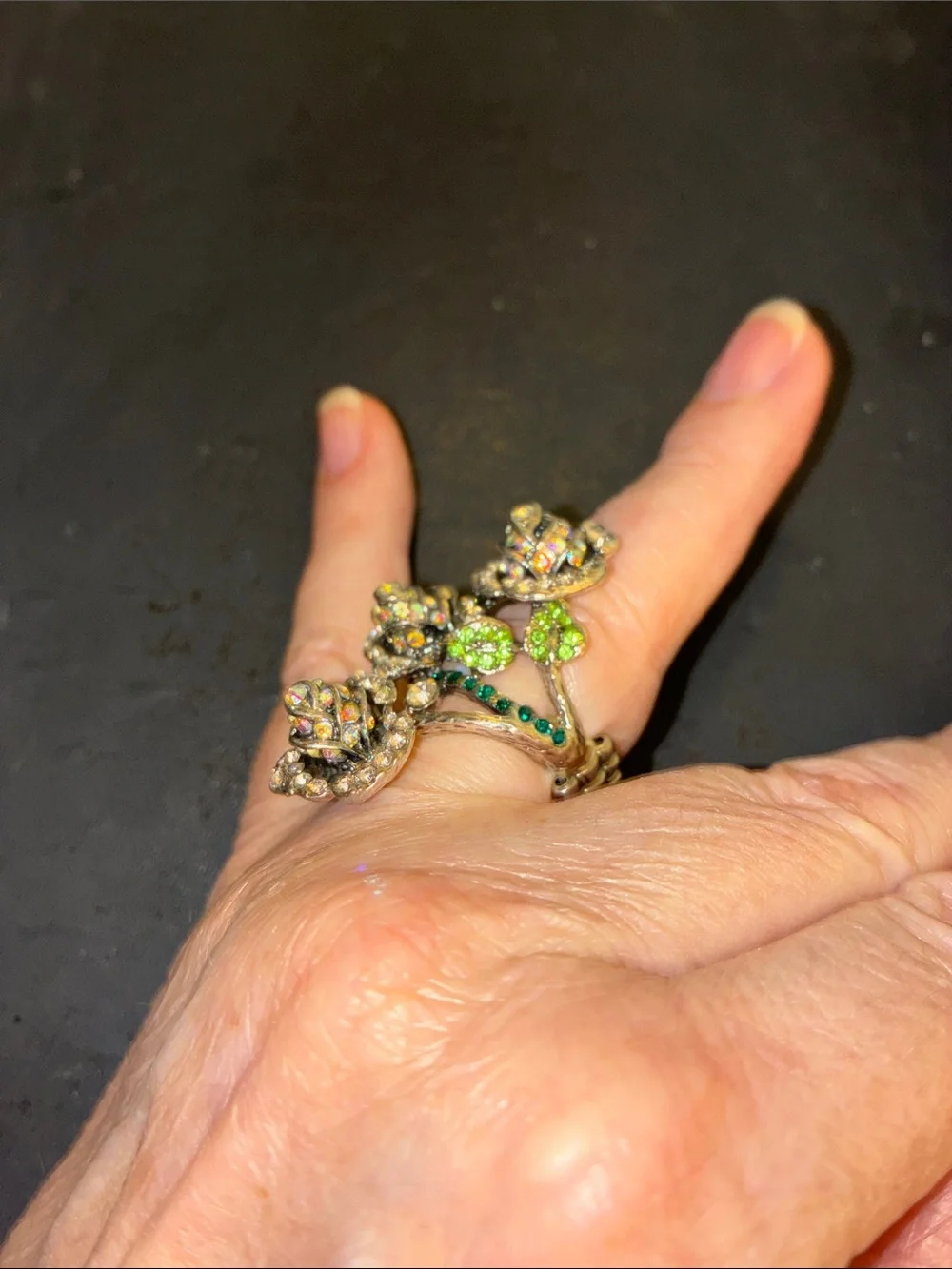 Featuring Three Crystal Rose Blooms Cocktail Stretch Ring with Green Accents